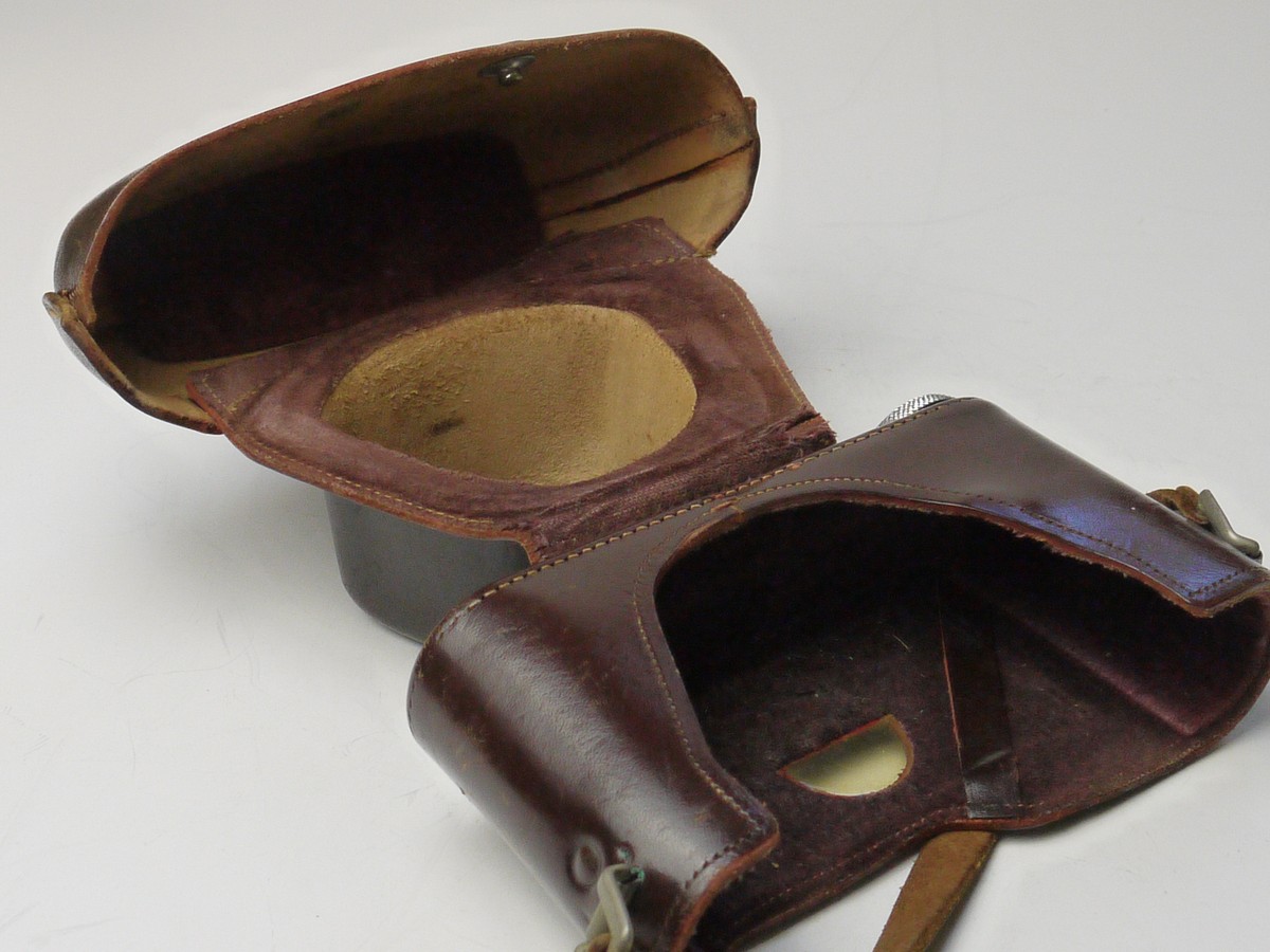 mwclassiccameras-20250321-61 Leitz brown leather ER case for the M2/M3, with strtap. Has long nose front, single fastener at the back, small tripod bush