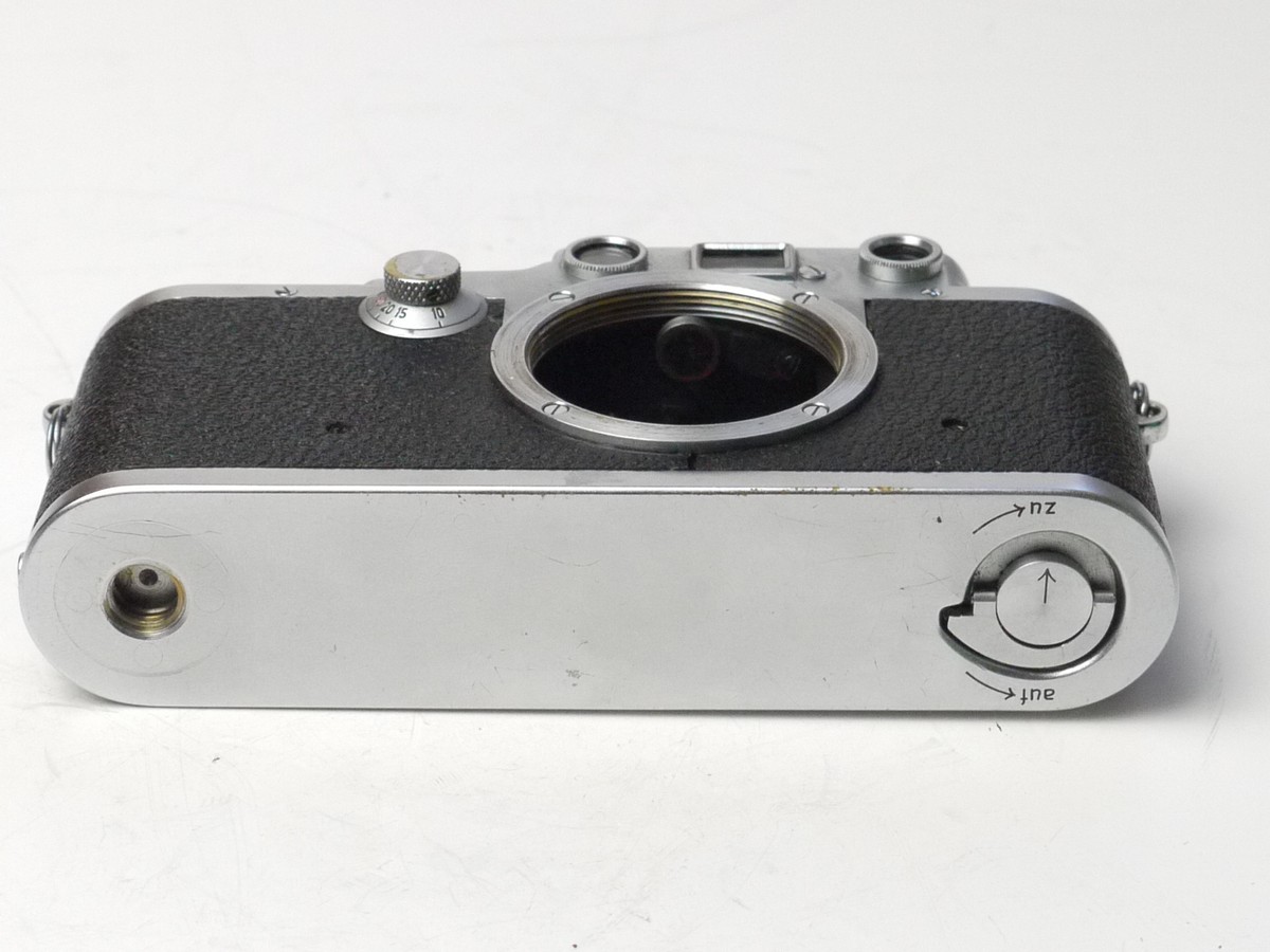 mwclassiccameras-20250321-84 Leica IIIc chrome body COLLECTABLE WARTIME MODEL with rewind lever on the top plate "Step" and with one Red Shutter Blind (No.370692). UNCOMMON VERSION