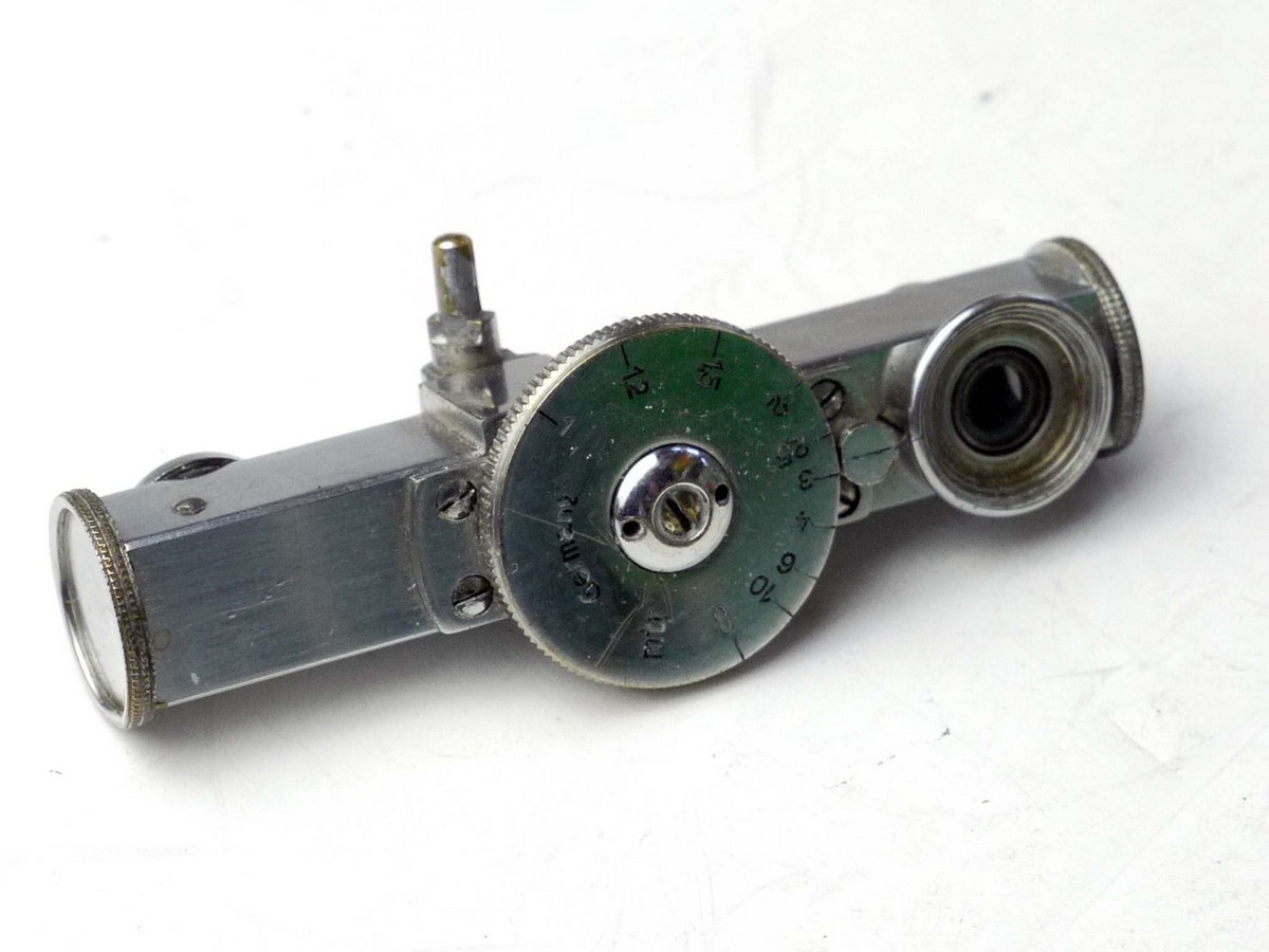 mwclassiccameras-20250404-139 German made short base rangefinder, chrome, with pillar (No Accessory Shoe) Scale in Metres. Copy of the Leitz HFOOK