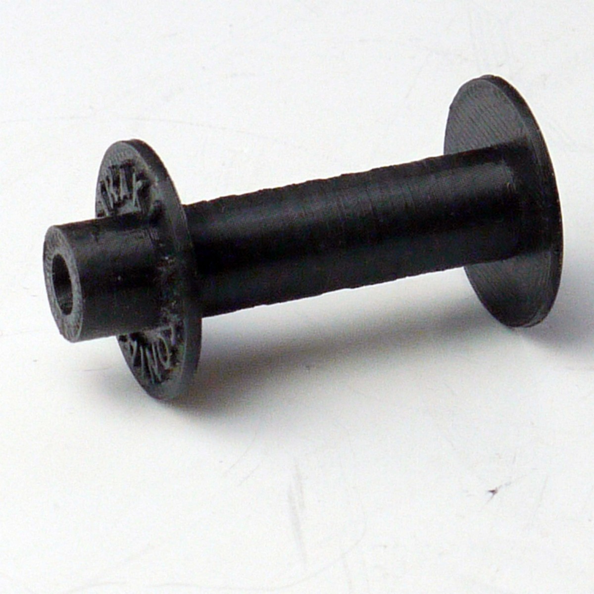 mwclassiccameras-20250404-174 Zeiss Ikon Contax Plastic Take-Up Spool for vintage rangefinder cameras. Marked "Contax Petrakla" at the end