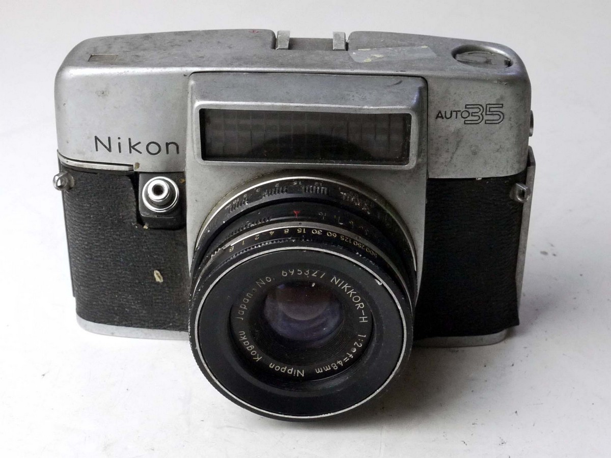 mwclassiccameras-20250404-221 Nippon Kogaku Nikon Auto 35 35mm Selenium metered SLR with 48mm f2 Nikkor-H fixed lens & behind-lens leaf shutter. UNCOMMON CAMERA. SUITABLE FOR REPAIR/RESTORATION/SPARE PARTS