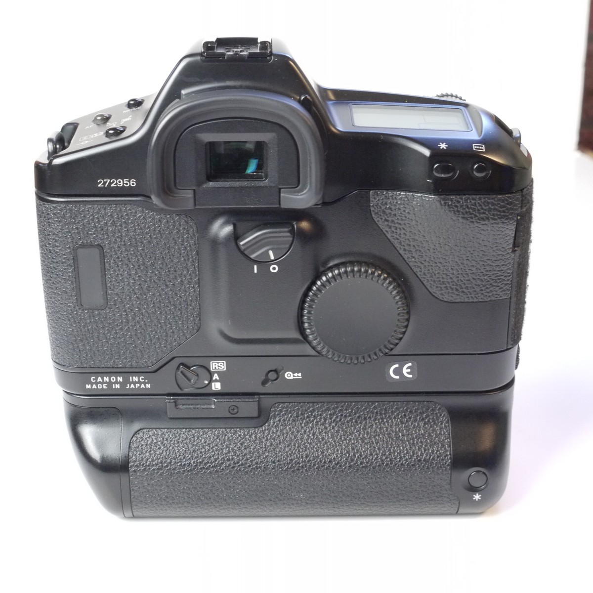 mwclassiccameras-20250411-3 Canon EOS-1n RS 35mm SLR body, fixed mirror version with fast 10 frames per second. With AA Battery holder & body cap. UNCOMMON