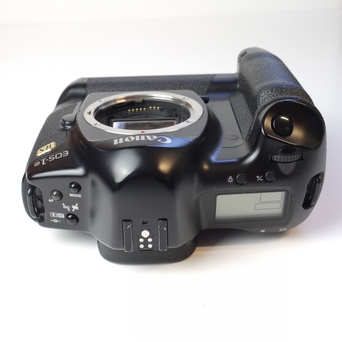 mwclassiccameras-20250411-4 Canon EOS-1n RS 35mm SLR body, fixed mirror version with fast 10 frames per second. With AA Battery holder & body cap. UNCOMMON