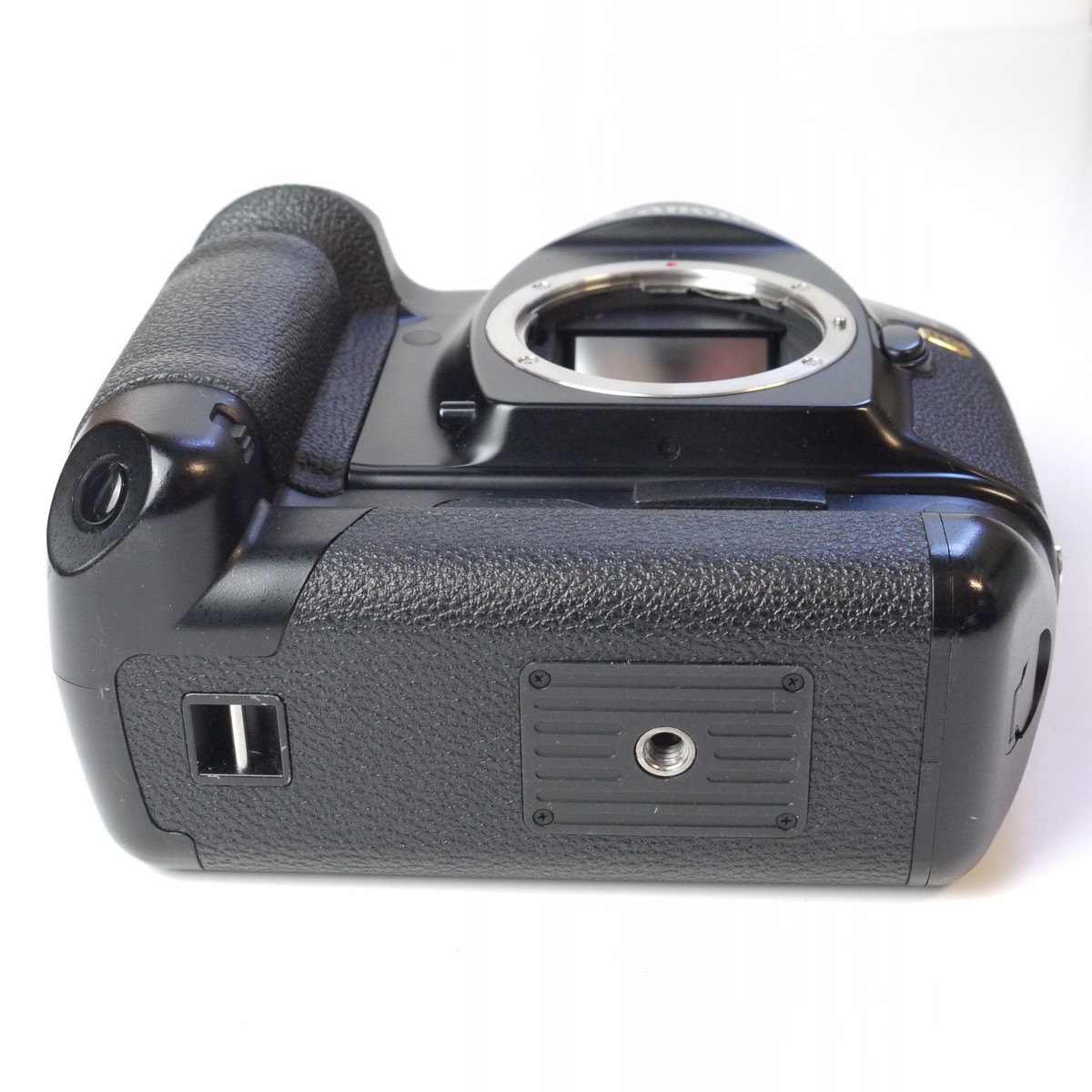 mwclassiccameras-20250411-5 Canon EOS-1n RS 35mm SLR body, fixed mirror version with fast 10 frames per second. With AA Battery holder & body cap. UNCOMMON