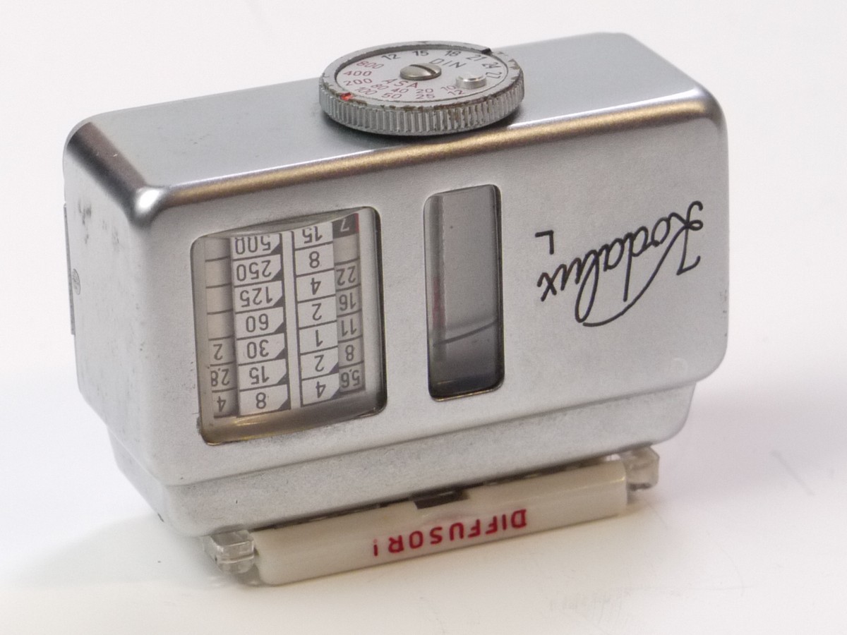 mwclassiccameras-20250418-68 Kodak Kodalux L Selenium cell shoe mounting meter with diffuser cover, leather case & Box