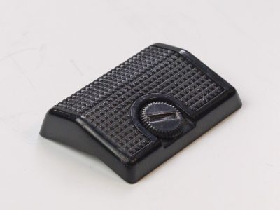Canon Hand Grip for the AE-1. Screws into the front of the body
