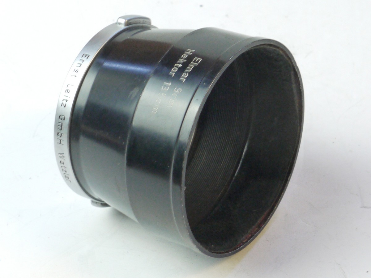 mwclassiccameras-20250509-159 Leitz Clip-on metal lens hood for 90 & 135mm (12575), with small chrome ring at the base