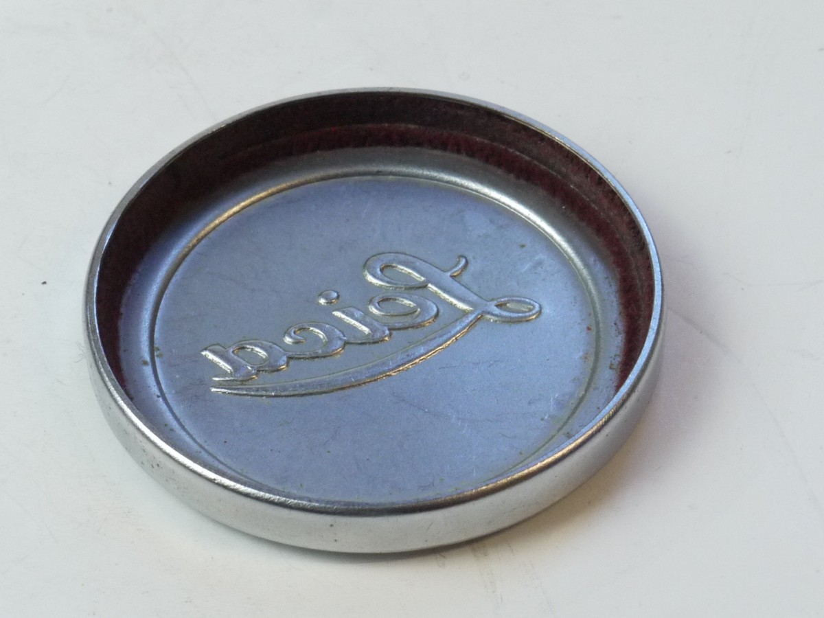mwclassiccameras-20250509-57 Leica Original 42mm Push-On chrome front lens cap (suitable for 50mm Summitar & Summicron Collaspsible Lenses). Shallow type with slightly raised centre & with Red felt inlay