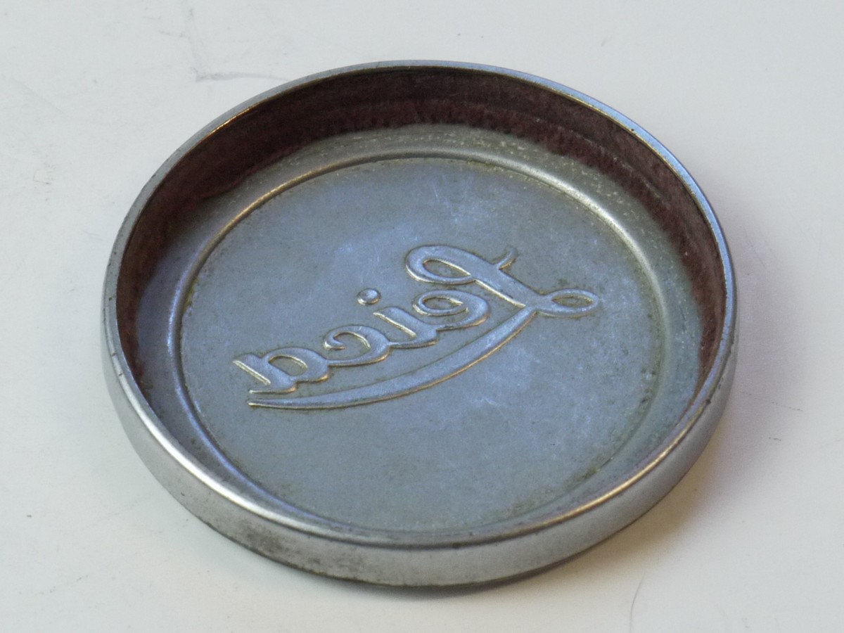 mwclassiccameras-20250509-59 Leica Original 42mm Push-On chrome front lens cap (suitable for 50mm Summitar & Summicron Collaspsible Lenses). Shallow type with slightly raised centre & with Red felt inlay