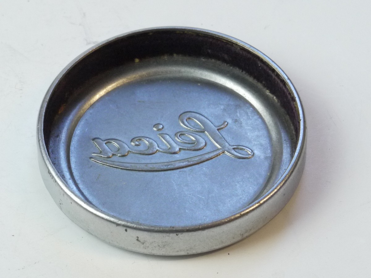 mwclassiccameras-20250509-61 Leica Original 42mm Push-On chrome front lens cap (suitable for 50mm Summitar & Summicron Collaspsible Lenses). Shallow type with slightly raised centre & with Red felt inlay