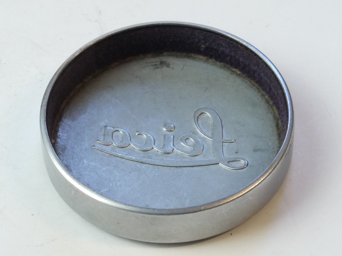 mwclassiccameras-20250509-65 Leica Original 42mm Push-On chrome front lens cap (suitable for 35 & 50mm Summicron lenses). Deeper Type With Red felt inlay