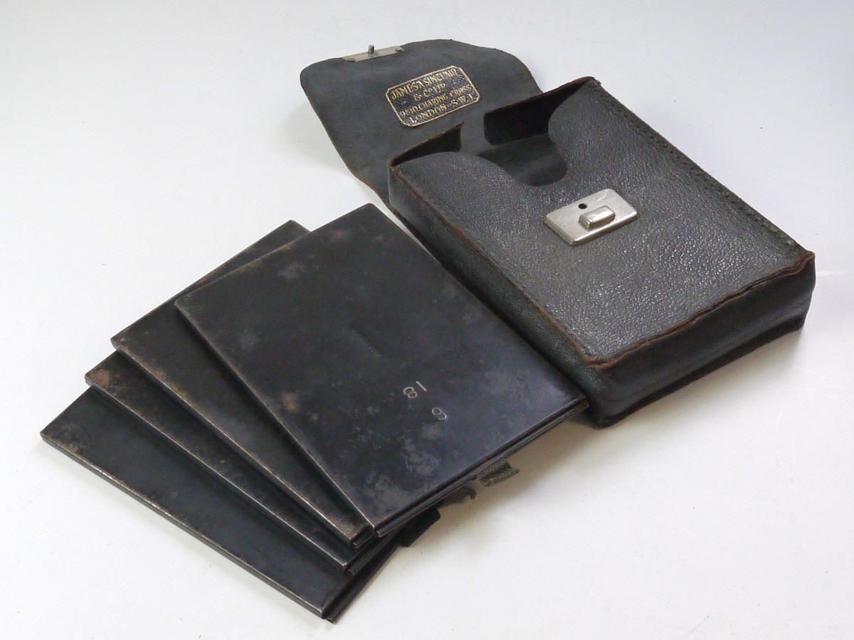 mwclassiccameras-20250523-119 James Sinclair & Co London Leather case with set of Four 10x8cm Cut-Film holders
