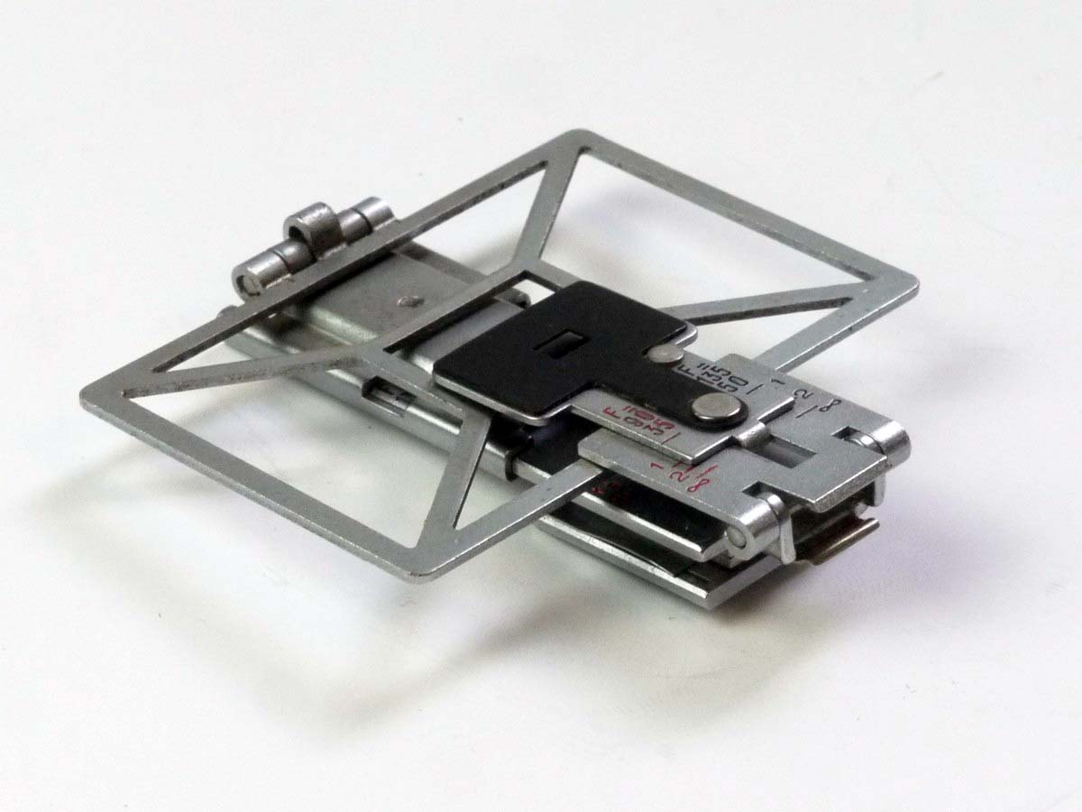 mwclassiccameras-20250530-129 Foca Folding Sports Finder, chrome, For Foca Leica Copy. Settings for 35, 50, 90 & 135mm. UNCOMMON