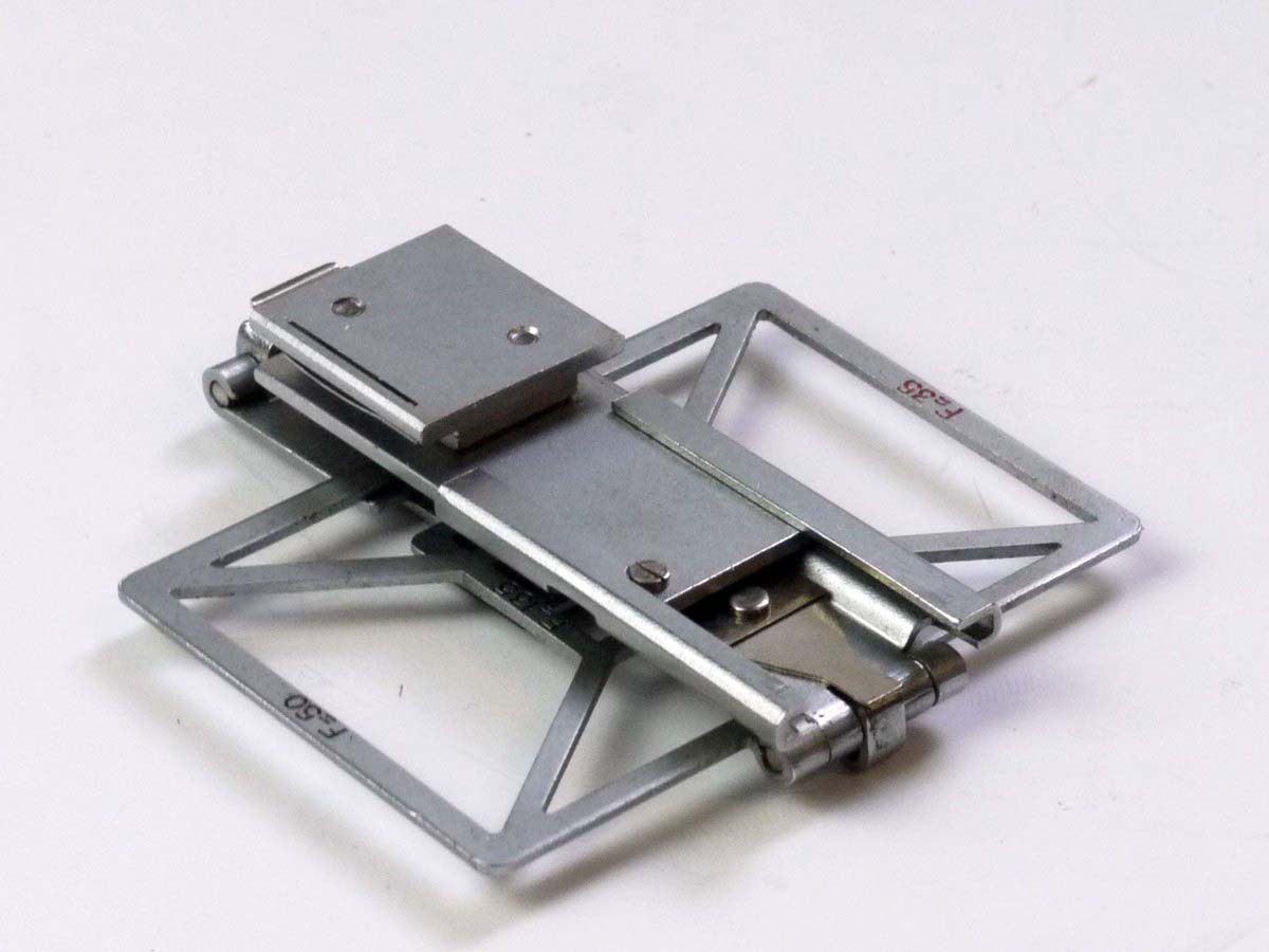mwclassiccameras-20250530-130 Foca Folding Sports Finder, chrome, For Foca Leica Copy. Settings for 35, 50, 90 & 135mm. UNCOMMON