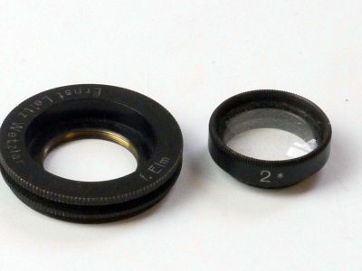 Leitz 34mm screw-in to 18/19mm filter adapter ring with a Leitz 19mm Close-Up *2 lens. For the Leitz 50mm f3.5 Elmar-L39 lens. UNCOMMON
