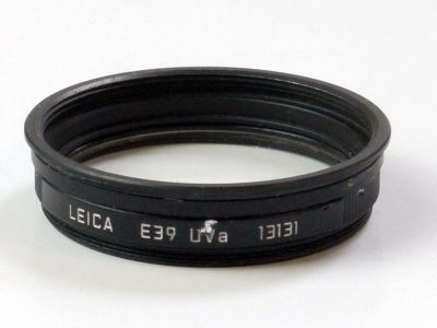 Leica E39 UVa filter black rim (13131) with an E39 to E41 step-up ring glued onto the front (we cannot remove it)
