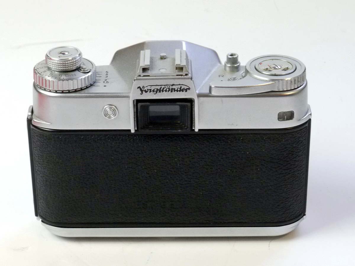 mwclassiccameras-20250530-71 Voigtlander Bessamatic 35mm selenium metered SLR + 50mm f2.8 Color-Skopar X interchangeable lens & Focal Press Guide