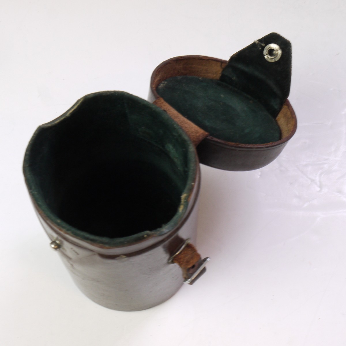 mwclassiccameras-20250620-204 Canon Hard leather bound brown lens case, marked on the top for the "Canon 85mm f1.9 R-A" (75mm x 110mm)