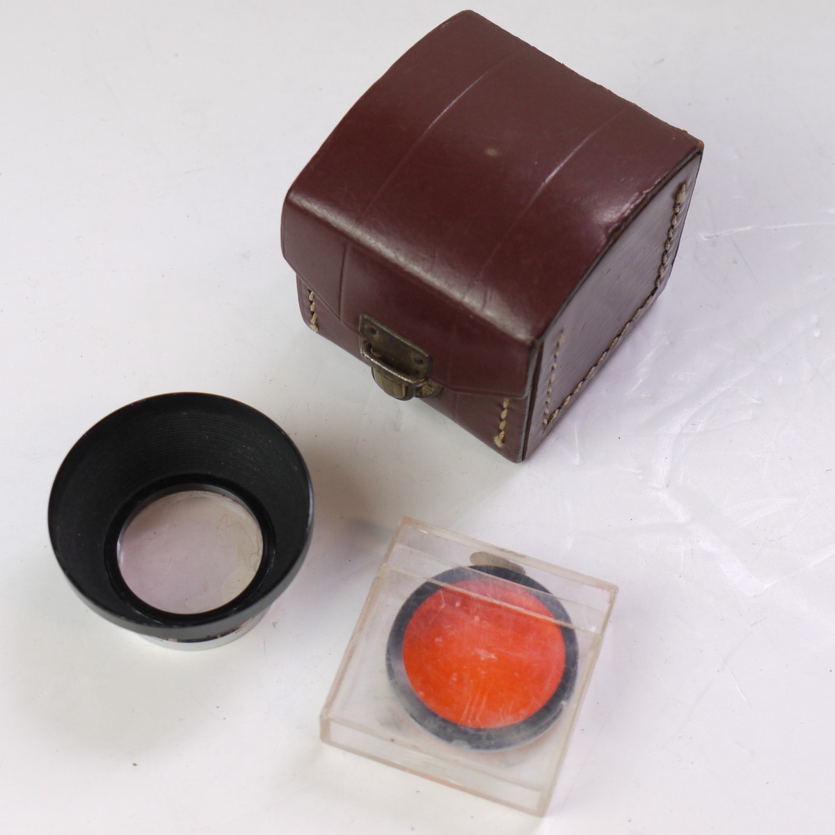 mwclassiccameras-20250620-237 Unbranded 32mm Push-On Clear & Orange Filters, with screw-in metal lens hood, filter Keeepr case & Semi-hard brown leather outfit case