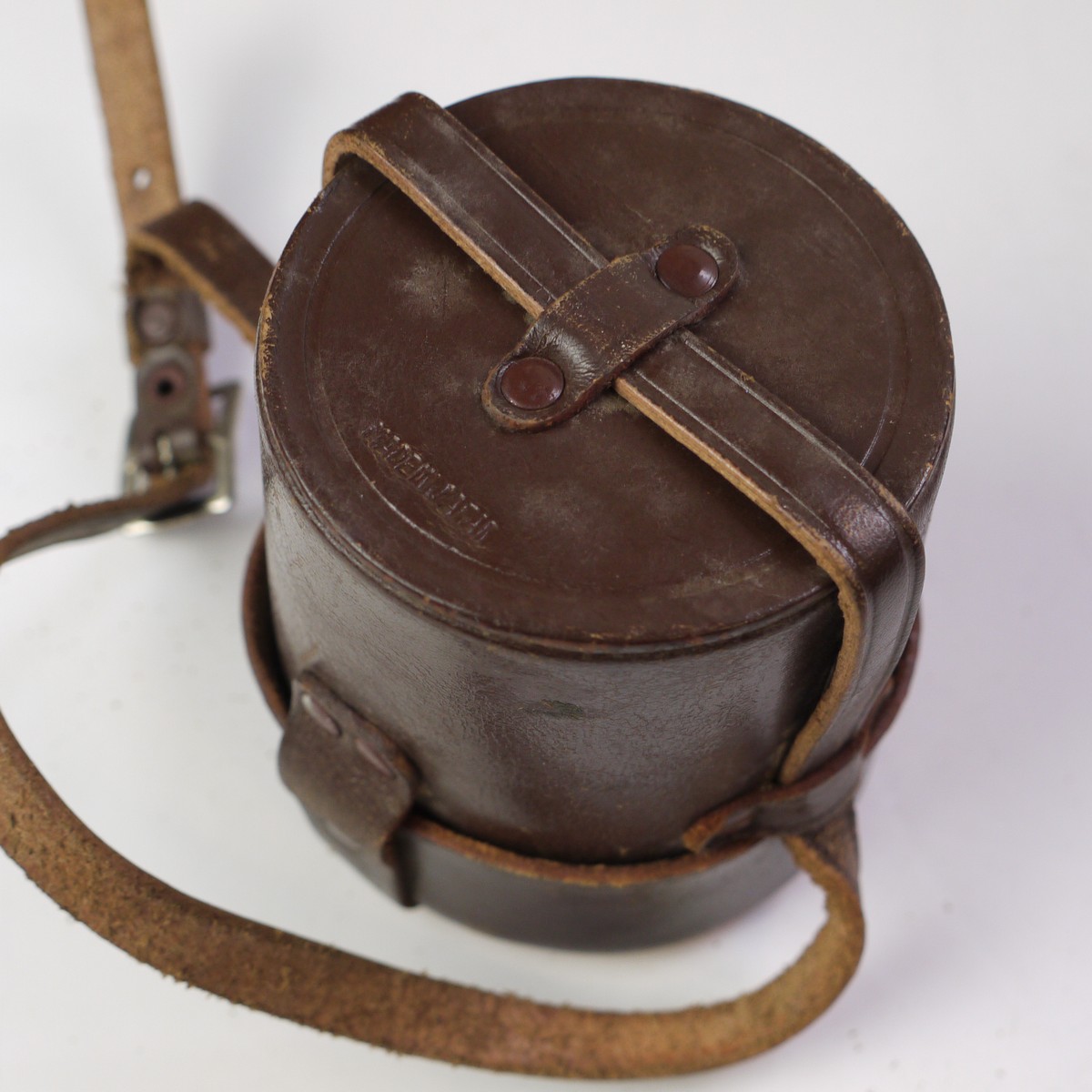 mwclassiccameras-20250620-257 Minolta Brown Leather Vintage lens case with short strap. (80mm x 90mm)