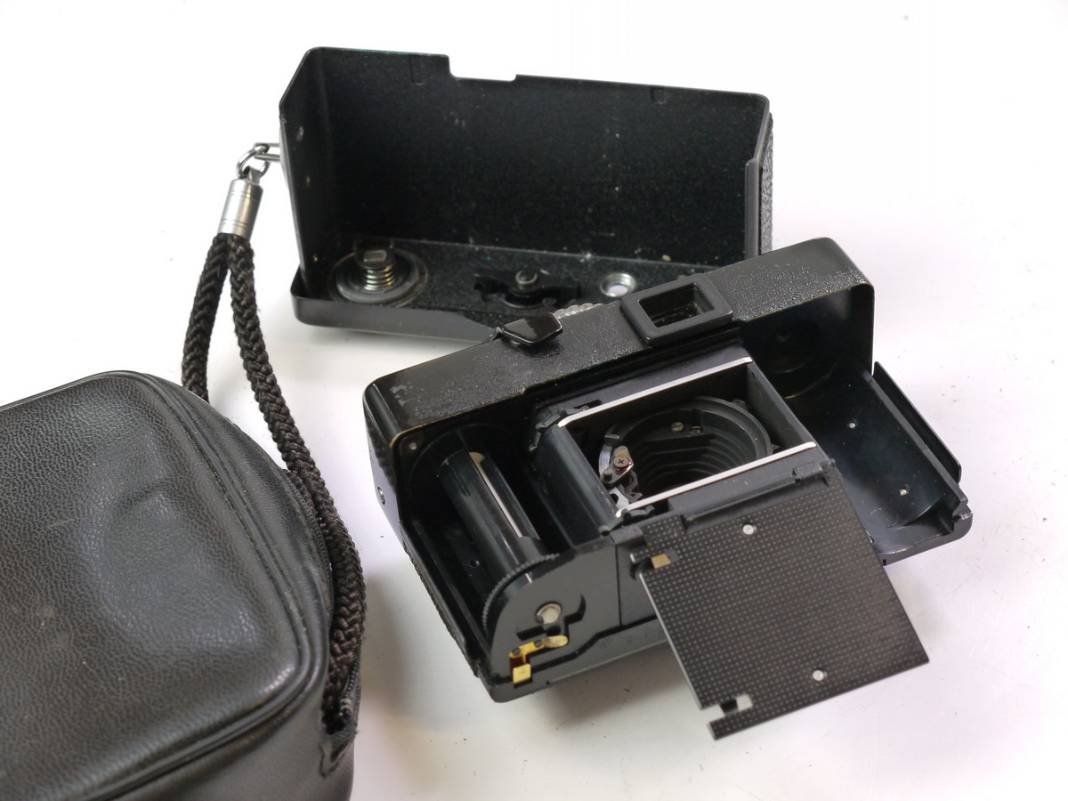 mwclassiccameras-20250620-279 Rollei B35 selenium metered 35mm camera, black, with Rollei 40mm f3.5 Triotar collapsible lens + Rollei wrist strap & Rollei Pouch Case