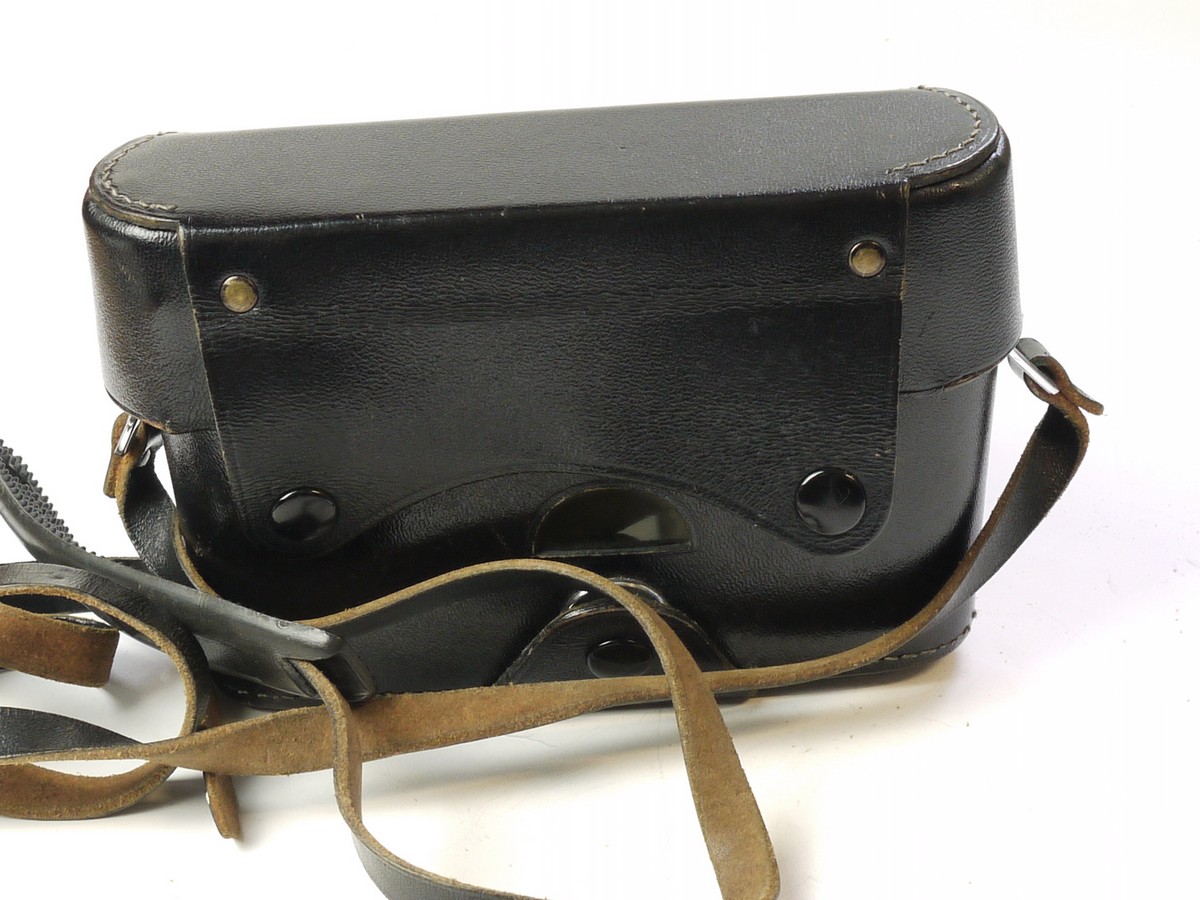mwclassiccameras-20250620-334 Leitz Black leather ER case with strap for M4, with small tripod mount & enlarged front.