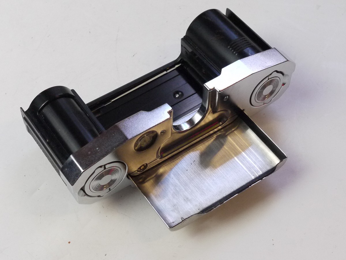 mwclassiccameras-20250627-138 Zeiss Ikon Contaflex Interchangeable Magazine Back, chrome, with dark slide