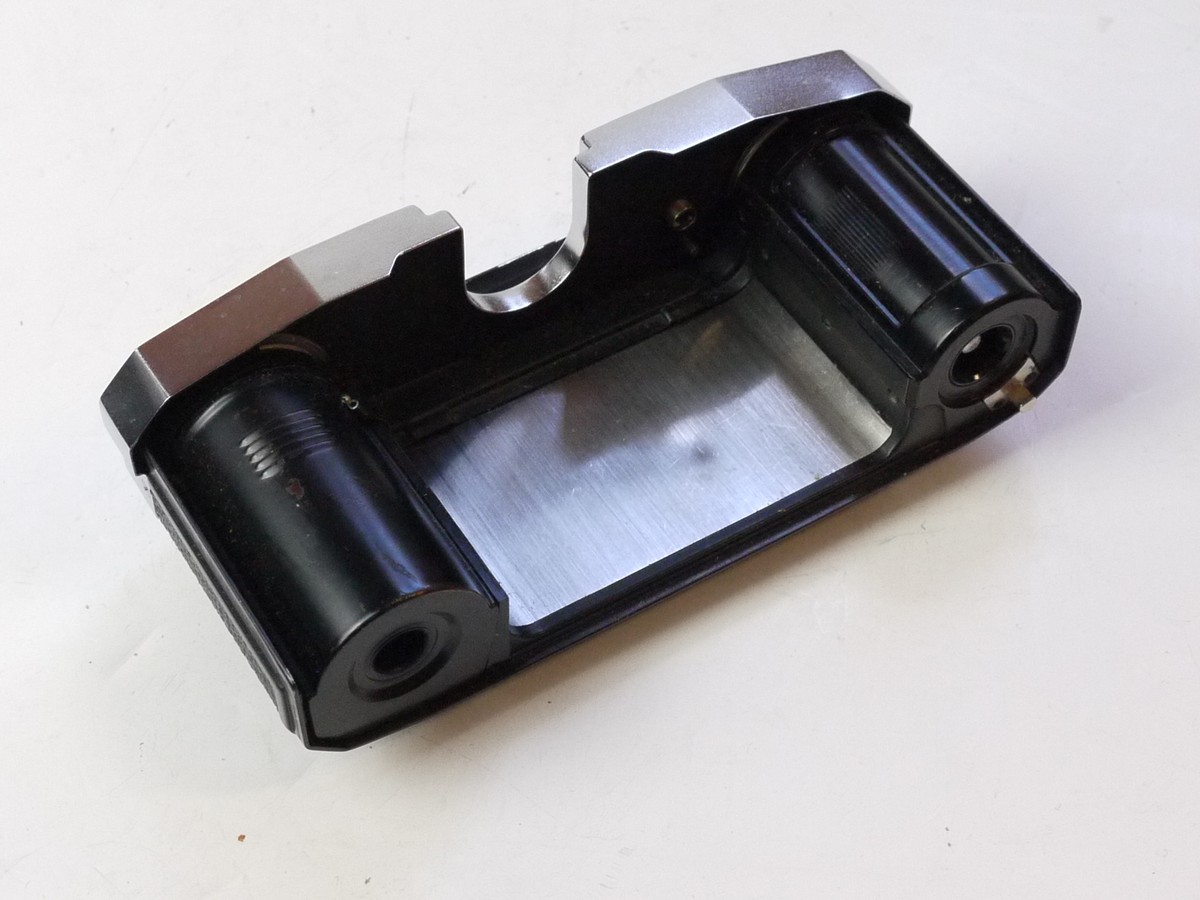 mwclassiccameras-20250627-139 Zeiss Ikon Contaflex Interchangeable Magazine Back, chrome, with dark slide