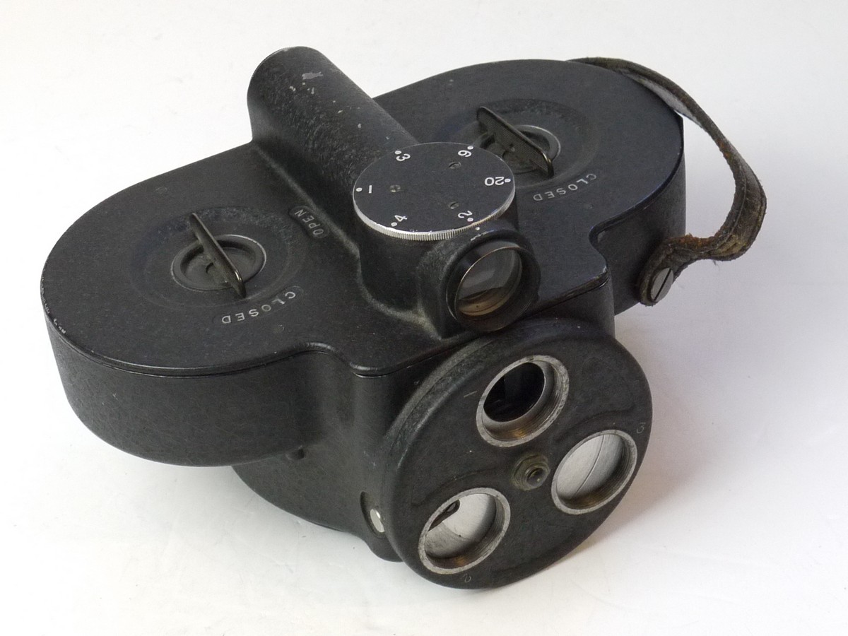 mwclassiccameras-20250704-145 Bell & Howell Standard 16mm Spring Motored Camera body, with triple Turrect (C mount). NON-WORKING