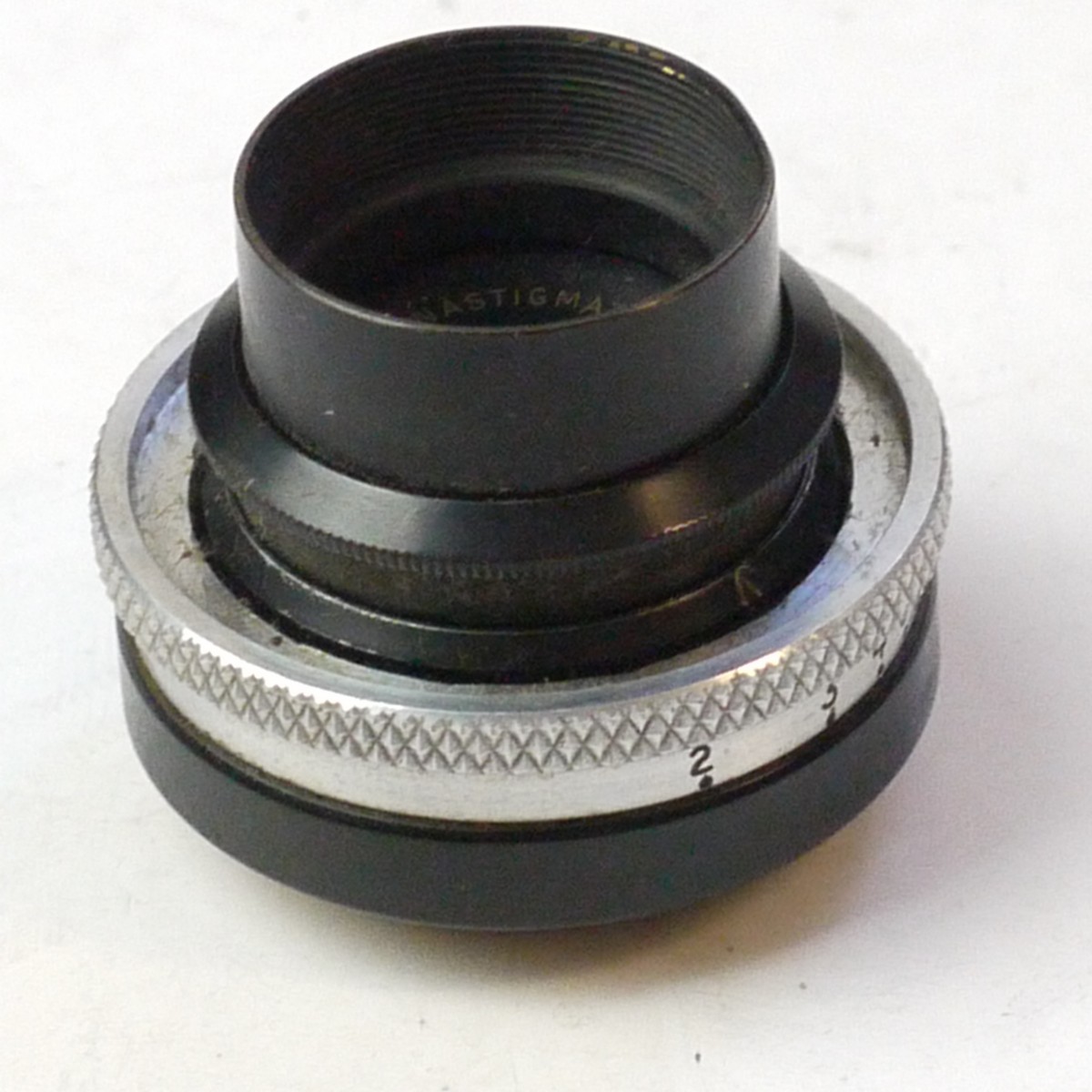 mwclassiccameras-20250704-193 Dallmeyer 1 inch f3.5 Anastigmat C mount (16mm) lens, with removable lens hood