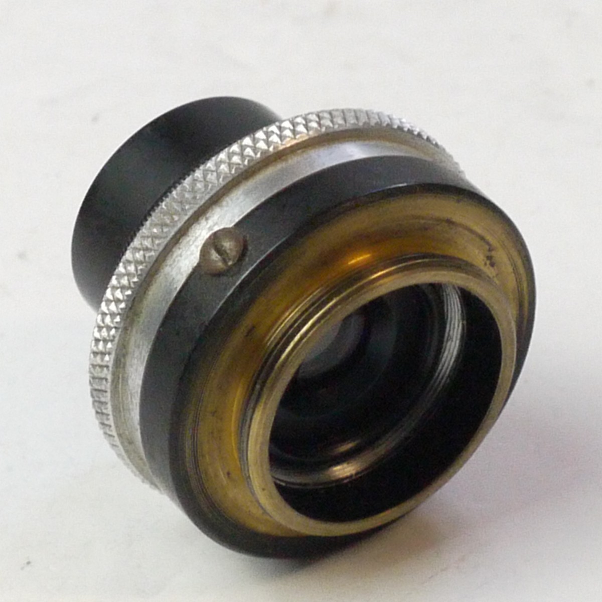mwclassiccameras-20250704-197 Dallmeyer 1 inch f3.5 Anastigmat C mount (16mm) lens, with removable lens hood