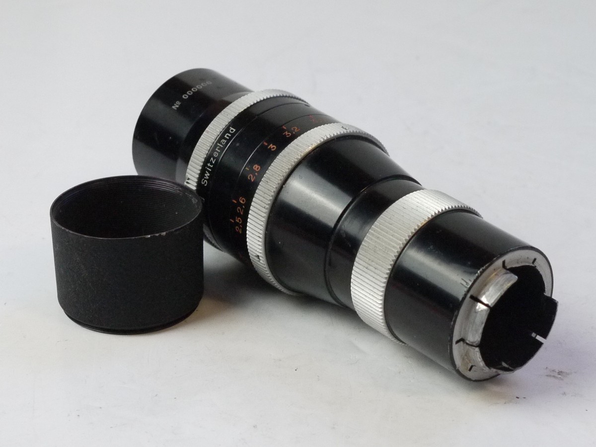 mwclassiccameras-20250711-171 Kern 100mm f3.3 Yvar AR Dummy/Display/Dealers lens with removable lens hood. SERIAL NO. 000000. Mo C mount, only a simpe push-on mount. UNCOMMON