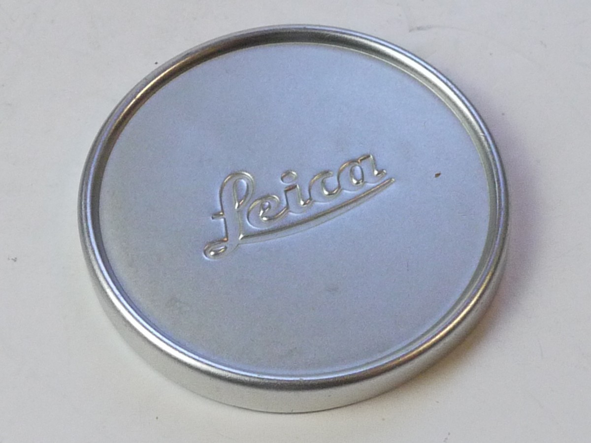 mwclassiccameras-20250711-224 Leitz "Leica" 56mm Push-on chrome front lens cap with edge ridge & red felt edge inlay