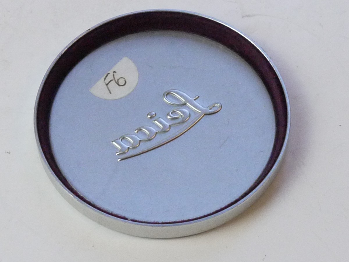 mwclassiccameras-20250711-227 Leitz "Leica" 56mm Push-on chrome front lens cap with edge ridge & red felt edge inlay