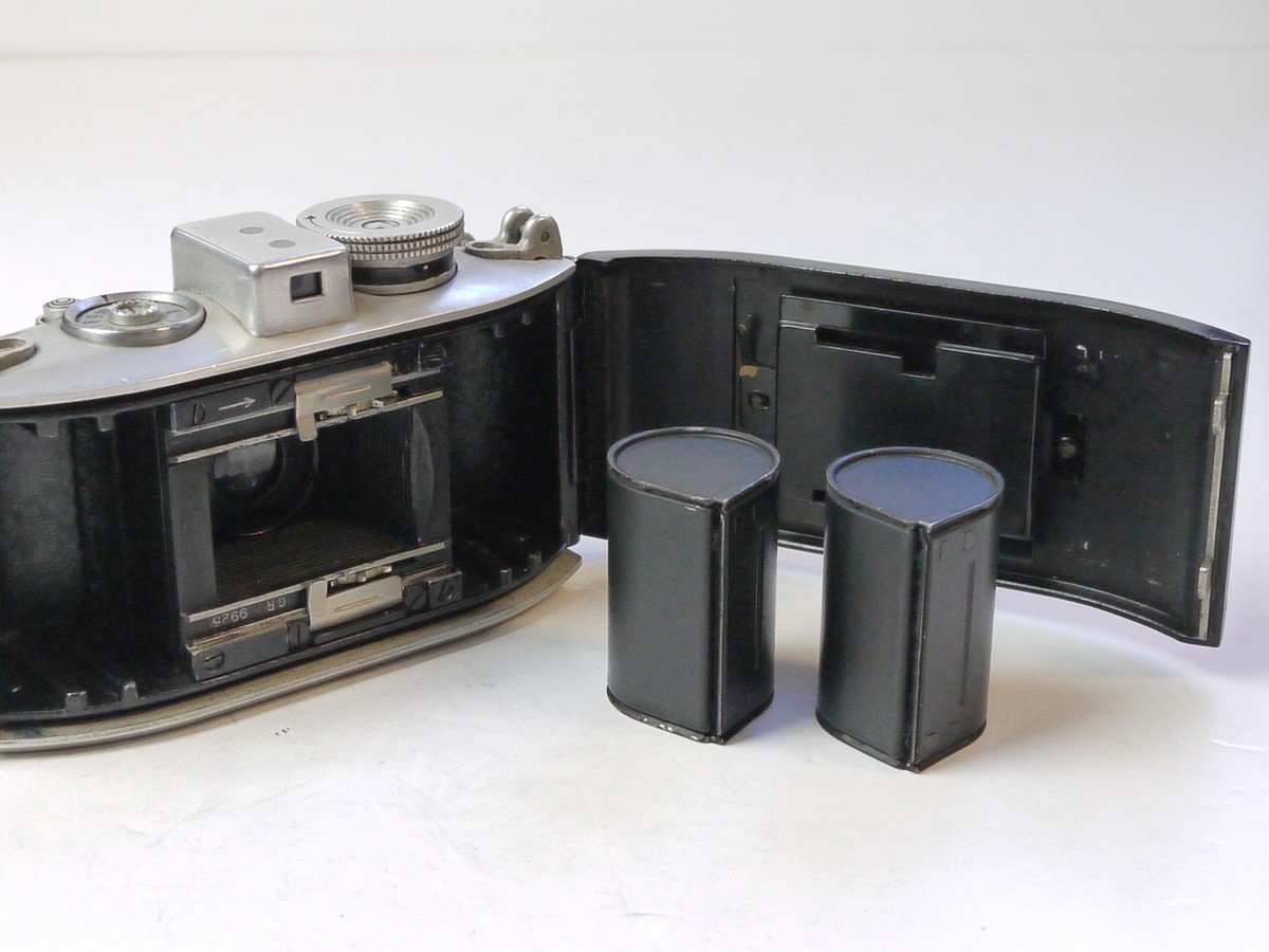 mwclassiccameras-20250711-9 Agfa Karat 35mm Viewfinder camera, taking Rapid cassettes, with 5cm f3.5 Solinar ubcoated lens in Compur shutter. With two cassettes