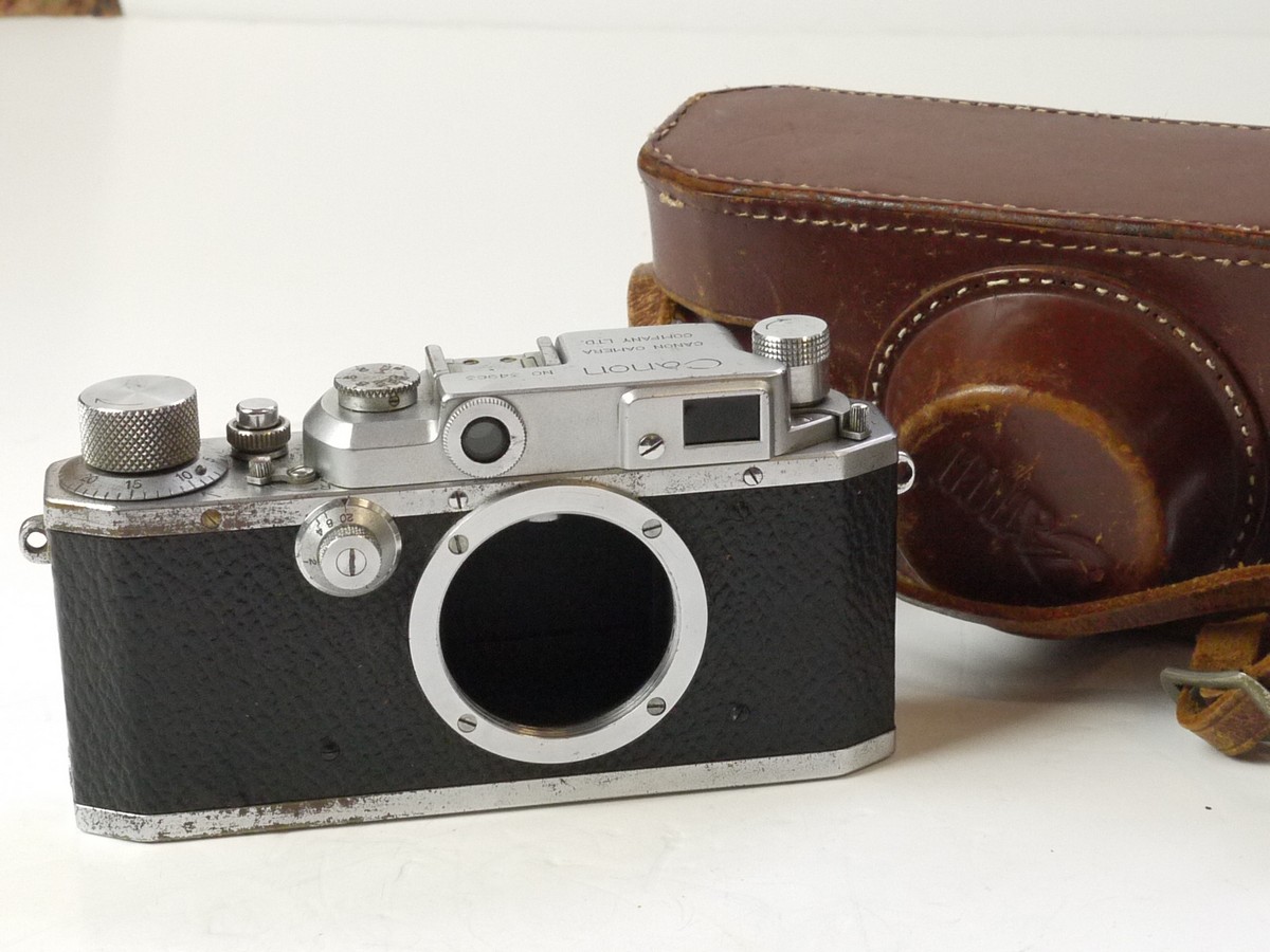 mwclassiccameras-20250725-25 Canon IIB body (No.34963) c1949-51, "Made in Occuped Japan" engraved on the base. L39 Screw mount Leica Copy with 3-frame combined viewfinder/rangefinder + Canon ER case. This is a later version with centred screw fitting on the rear body