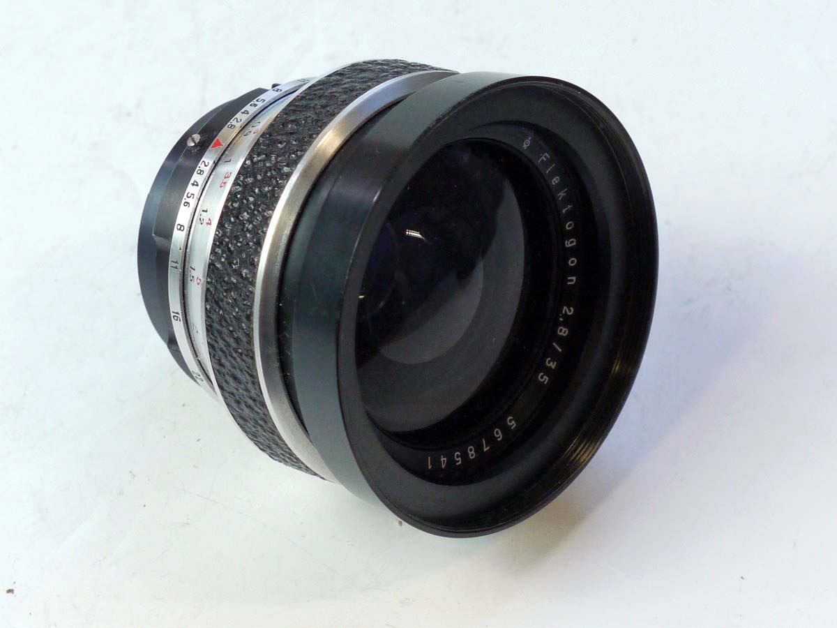 mwclassiccameras-20250801-113 Carl Zeiss 35mm f2.8 Flektogon lens for Werra, with screw-in lens hood. NEEDS REPAIR