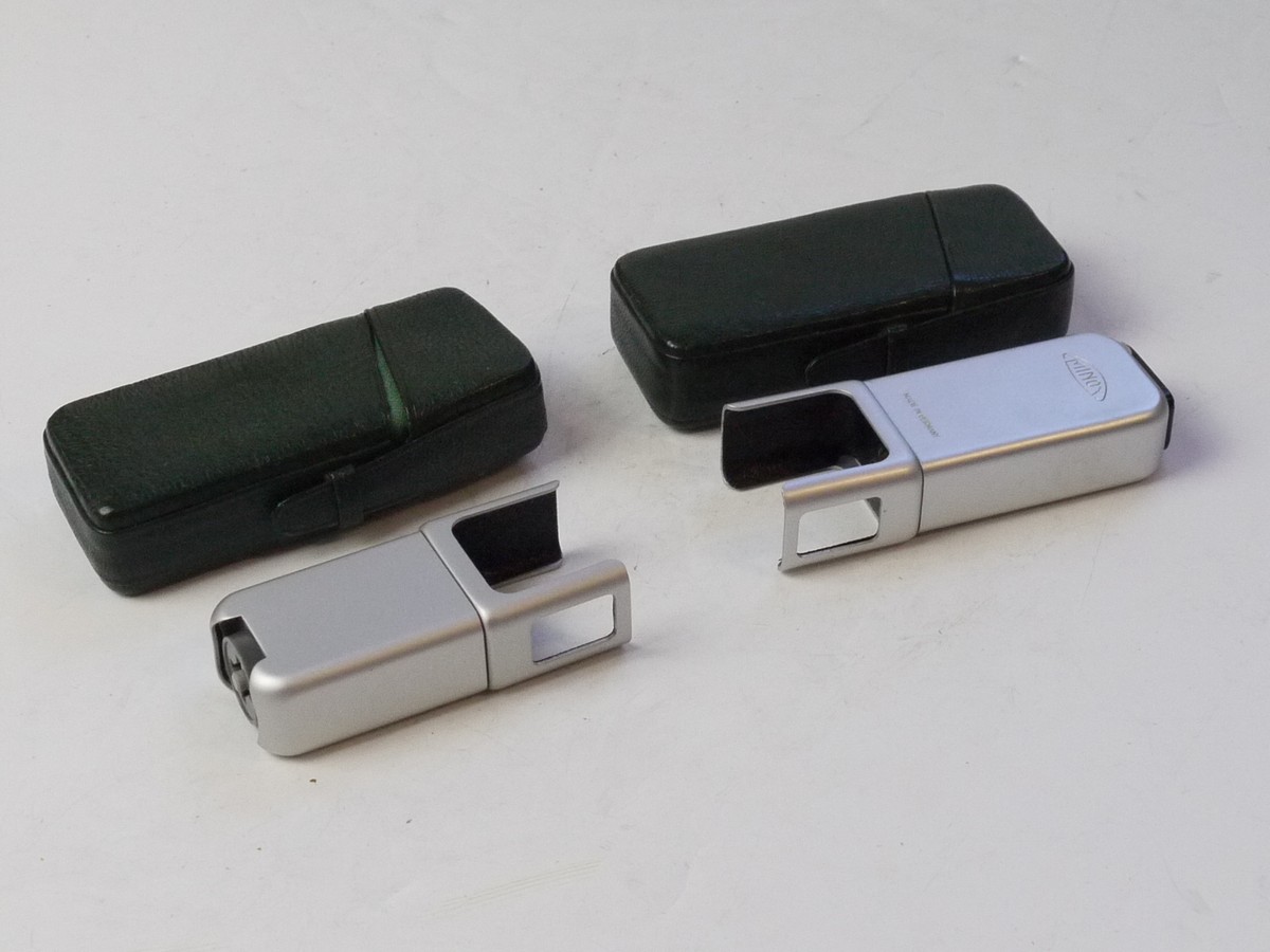 mwclassiccameras-20250808-197 Minox A/B Subminiature Accessories Set. Minox Flash Bulb Adapter + Minox flash Cube Holder, bi=oth in Minox GreeN leather cases