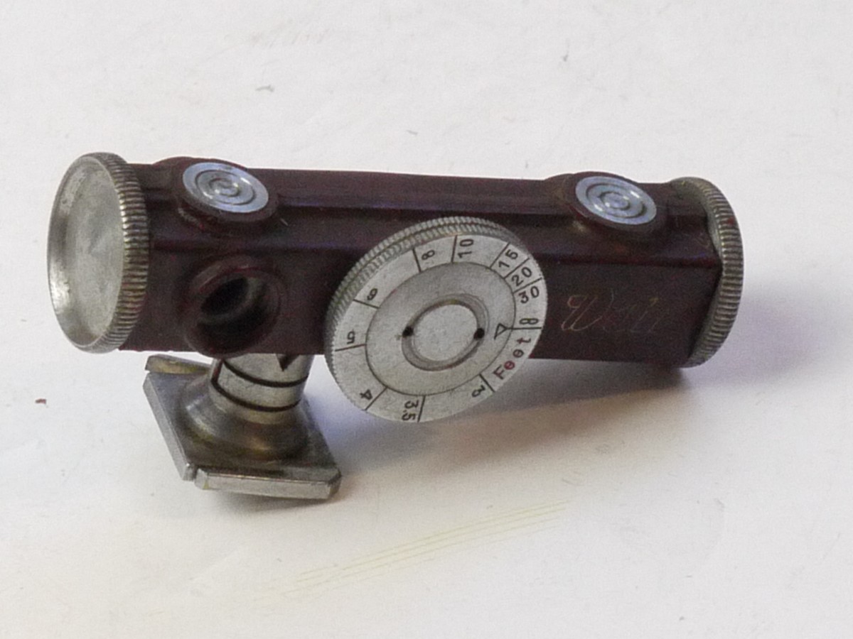 mwclassiccameras-20250808-222 Walz Short Base shoe mounting Rangefinder, Horizontal type with Brown casing. Scale in Feet. Has removable accessory shoe, similar to the Leica Rangeifnder. UNCOMMON