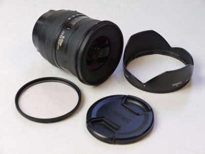 Sigma 10-20mm f4-5.6 DC HSM wide-angle zoom lens for Canon EOS APS-C cameras + Sigma bayonet lens hood & caps