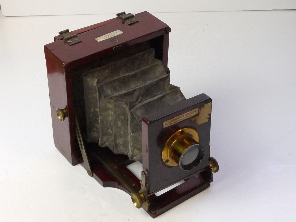 mwclassiccameras-20250808-90 J Lancaster Le Merveileaux 1/4 Plate Mahogany Fiedl Camera with black bellows & simple unbranded brass lens. NEEDS RESTORATION