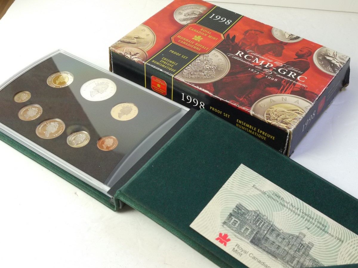 mwclassiccameras-20250815-75 Royal Canadian Mint Proof Set 1998. 8 Coins Set including the Candian Silver Dollar. With Wallet, COA, Presentation Case & Box