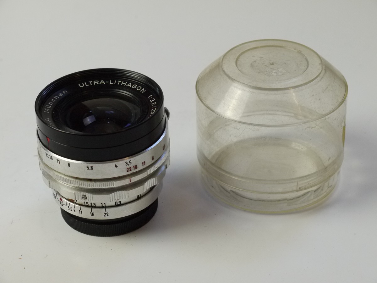 mwclassiccameras-20250822-105 Enna Munchen 28mm f3.5 Ultra-Lithagon coated all chrome pre-set lens in manual Exakta mount + rear cap & keeper case