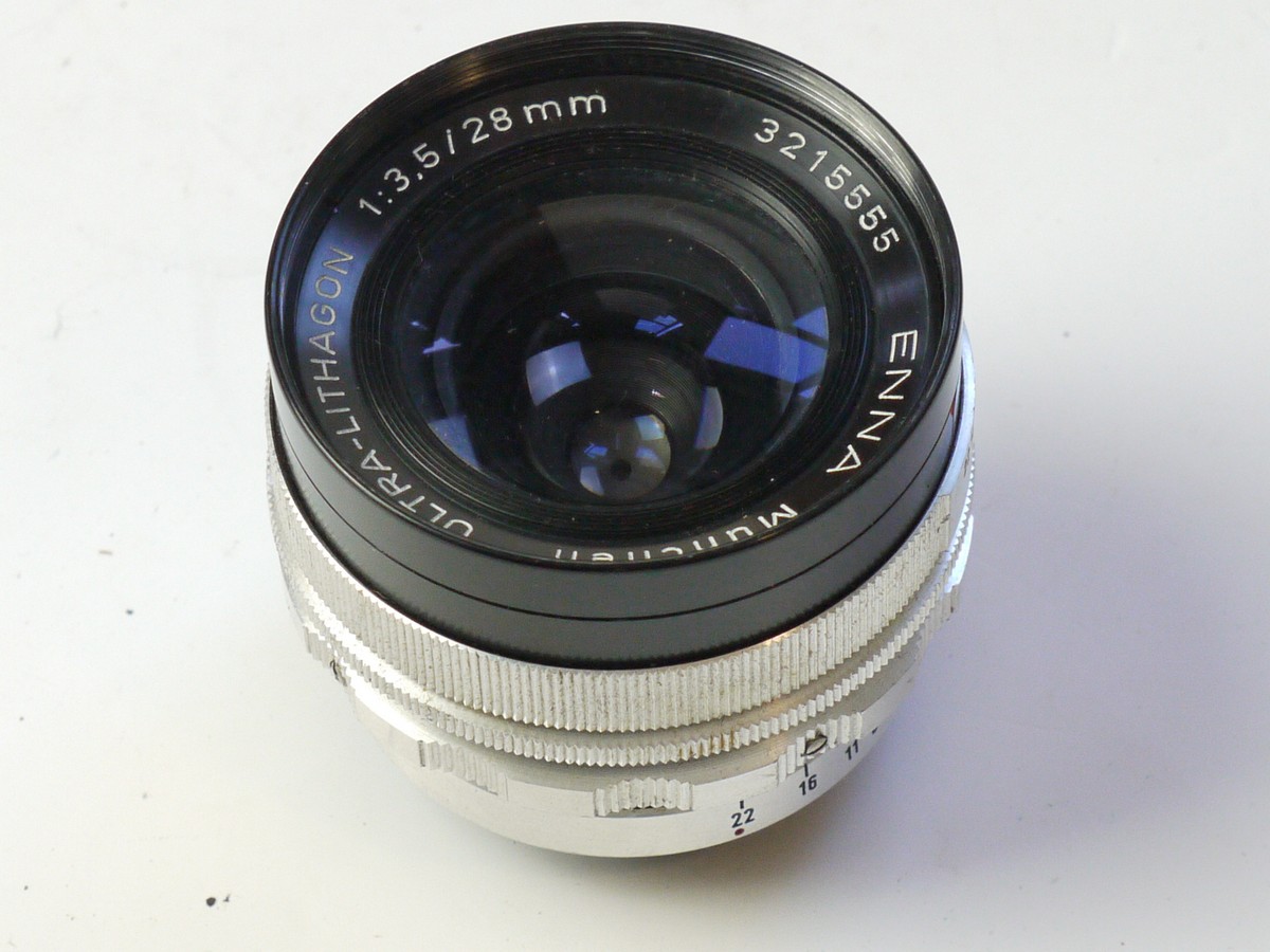mwclassiccameras-20250822-106 Enna Munchen 28mm f3.5 Ultra-Lithagon coated all chrome pre-set lens in manual Exakta mount + rear cap & keeper case