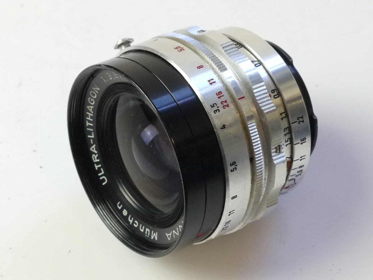 mwclassiccameras-20250822-108 Enna Munchen 28mm f3.5 Ultra-Lithagon coated all chrome pre-set lens in manual Exakta mount + rear cap & keeper case