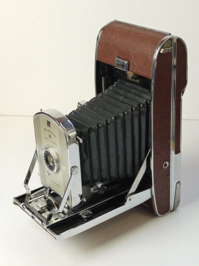 Polaroid Land Camera Model 95A. Albada & Sports Finder, Brown Covering. Black Bellows. Single speed Shutter