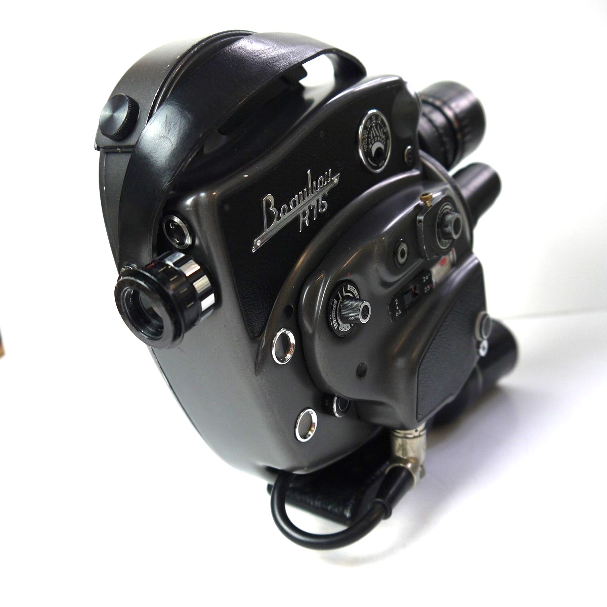 mwclassiccameras-20250926-12 Beaulieu R16 Battery Motorised 16mm Reflex camera + Angenieux 17-68mm f2.2 Zoom Type 4x17B interchangeable lens, S.7 lens ring ("4x17, 4x17.5, 4x20, 4x28"), 3 x different rubber eyecups with one fixing ring, Beaulieu Handgrip Battery, Beaulieu Battery Charger, Original Instructions & Bealieu Outfit Carrying case