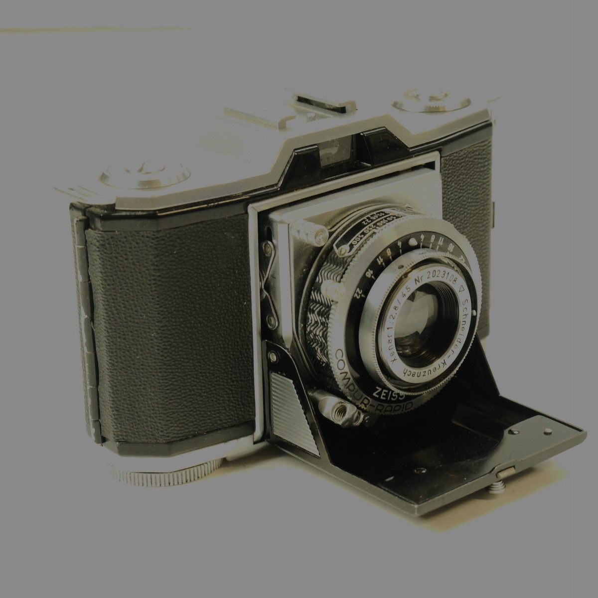 mwclassiccameras-20251003-2 Zeiss Ikon Ikonta 522/24 35mm folding camera with Schneider 45mm f2.8 Xenar lens in Compur Rapid shutter. A nice quality compact folding camera with a good lens
