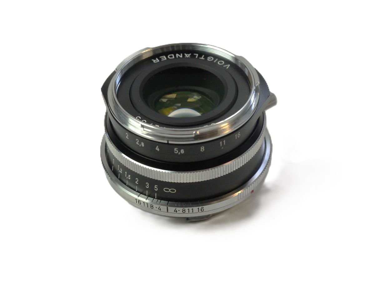 mwclassiccameras-20251024-118 Voigtlander 35mm f2 Ultron VM Aspherical Vintage Line Silver Leica M Mount lens + Voigtlander Caps & Matching numbered Box with Packaging