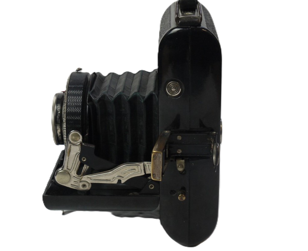 mwclassiccameras-20251024-134 Wirgin Wirginex Baky 6x4.5 on 120 Black Bakelite folding camera c1956 with folding Albada Finder & Rodenstock 7.5cm f2.9 Trinar Anastigmat lens in Compur shutter